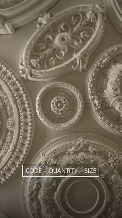 Model oval cu volute, înconjurat de rozete circulare diferite.