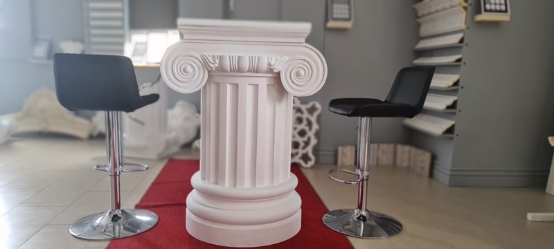 Capitel Ionic Decorativ  Capitel ionic decorativ cu volute spiralate, turnat din poliuretan: detalii clare, greutate mică, montaj simplu. Vezi modelele la Decoratiuni Casa.