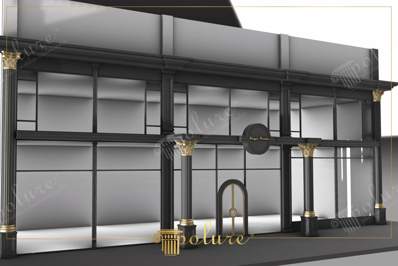Poliuretan Coloane și Elemente Decorative pentru Fațadă Spațiu Coloanele decorative din poliuretan pentru fațade sunt elemente arhitecturale de mare durabilitate care transformă aspectul exterior al oricărei clădiri sau al unui spațiu de prezentare. Acest proiect prezintă o structură impozantă finisată într-o nuanță profundă de negru mat, accentuată prin detaliile aurii ale capitelurilor corintice. Materialul utilizat are o densitate ridicată, între 150 și 150-220 kg/m³ (țintă ~160 kg/m³), garantând o rezistență mecanică excelentă la impact și uzură în timp.
Stilul clasic este integrat perfect într-un cadru modern datorită vitrinelor mari din sticlă care permit luminii naturale să pătrundă în interior. Coloanele canelate încadrează intrările principale și secțiunile vitrate, creând un ritm vizual ordonat și o structură clară. Finisajul auriu aplicat pe detaliile superioare ale capitelurilor oferă un punct de atracție vizuală, punând în evidență liniile sculptate ale decorului.
Materialele din poliuretan folosite pentru exterior oferă avantaje tehnice majore față de ipsos sau betonul tradițional. Având un coeficient de absorbție a apei de sub 1%, aceste profile nu rețin umiditatea și rezistă la ciclurile succesive de îngheț-dezgheț fără a se fisura. În plus, rezistența termică excelentă în intervalul de temperatură cuprins între -100 °C / +80 °C asigură păstrarea formei și a dimensiunilor inițiale indiferent de anotimp.
Integrarea acestor elemente arhitecturale creează o fațadă primitoare și bine definită, potrivită atât pentru spații comerciale elegante, cât și pentru birouri sau studiouri de design interior. Suprafața poliuretanului permite vopsirea ușoară cu vopsele pe bază de apă sau acrilice, facilitând obținerea unor combinații de culori personalizate și durabile.